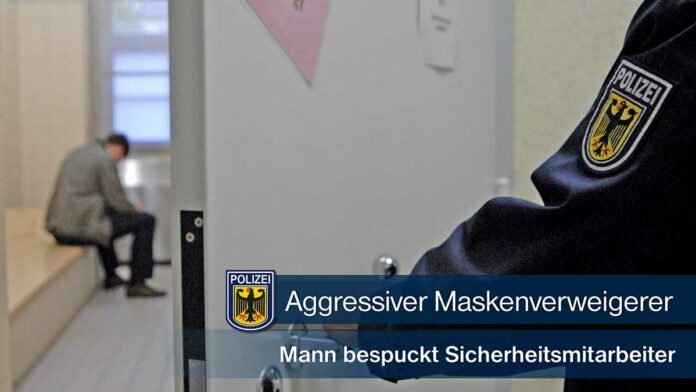 Aggressiver Maskenverweigerer - Mann bespuckt Sicherheitsmitarbeiter