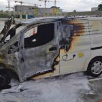 Brennende Fahrzeuge - Rauchschwaden über dem Olympiadorf