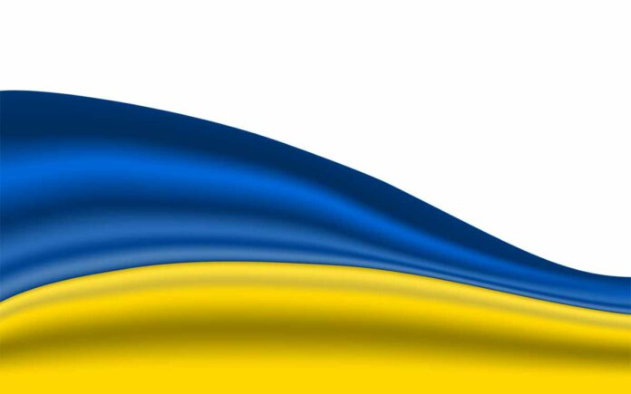 St. Patrick’s Day 2022 - Kein „Greening“ : Maximiliansbrücke leuchtet in den Farben der Ukraine